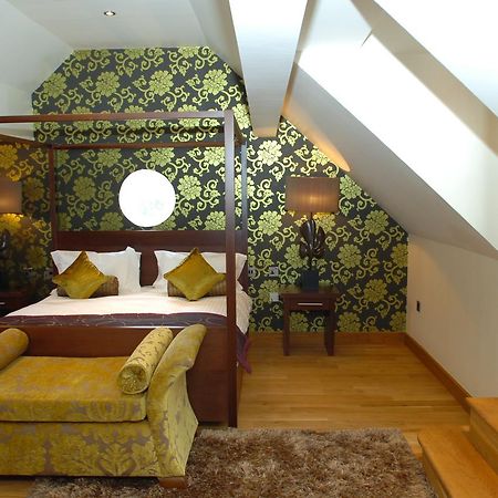 The Bear'S Paw Hotel Warmingham Eksteriør billede A suite at the hotel