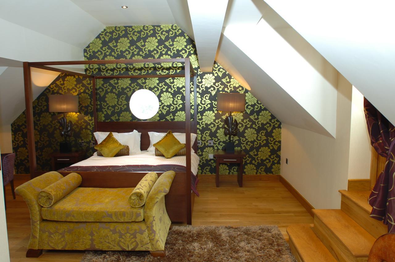 The Bear'S Paw Hotel Warmingham Eksteriør billede A suite at the hotel